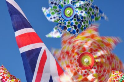A picture of a Union Jack flags and 2 childrens windmills