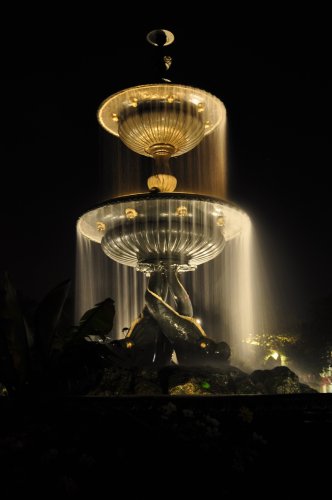 Victoria fountain at night with the water blurred
